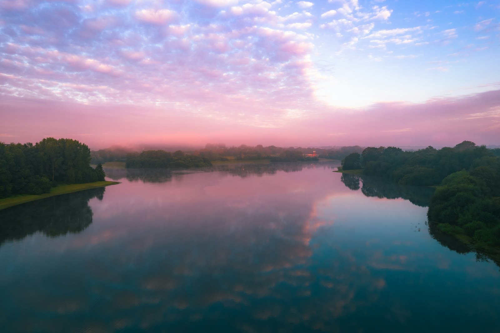 A lake beneath an evening sky